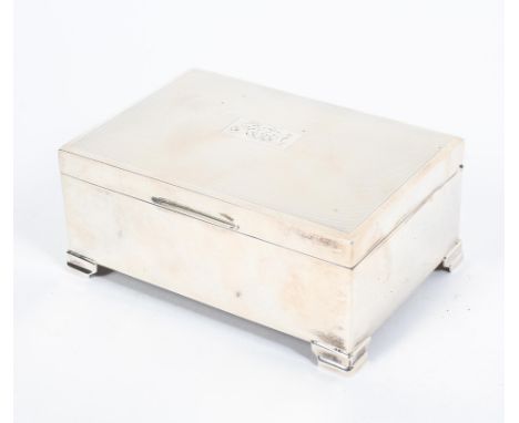 A sterling silver engine turned table top cigarette box with cedar wood lining  by Harman Brothers Birmingham, 1962. Gross we