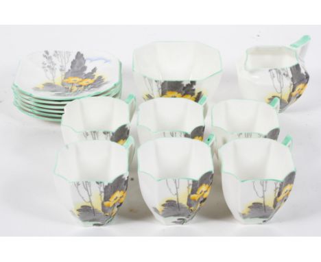 A Shelley part tea service, Queen Anne shape, circa 1930, printed green marks, printed with yellow flowers in landscape, with