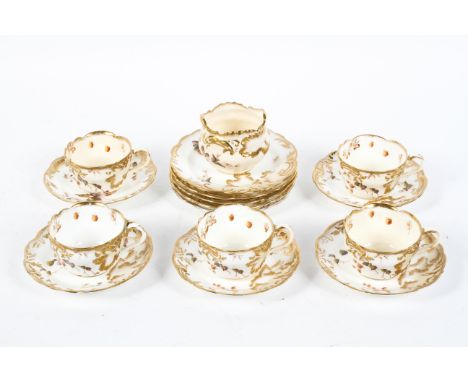 A Crescent China porcelain five piece part tea service, circa 1910, printed brown marks, printed with strawberries, enriched 