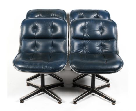 A set of four 1960's vintage Charles Pollock leather and chromed executive chairs in a dark blue colourway, raised on a four 