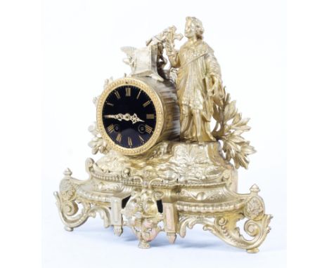 A Continental late 19th century gilt-metal striking mantel clock,the case surmounted with St John flanked by berried foliage 