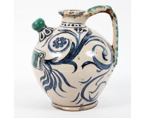 A South Italian maiolica wet-drug jar (albarello), named for ACETO on green banner amongst blue flowering tendrils, probably 