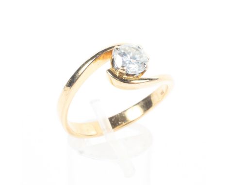 An 18ct gold single stone ring set with a round brilliant cut diamond estimated to weigh approximately 1.00ct. Colour: J/K Cl