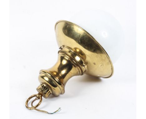 A brass hanging lamp, with opaque glass dome shade, with loop for suspension, 20th century, 56 cm high 