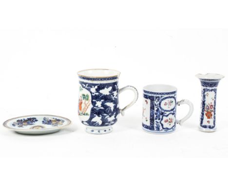 Two Chinese Export mugs and an oval stand, the first painted with figures in landscape within blue cell pattern ground,15 cm 
