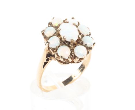 A 9ct gold opal cluster ring, London, 1982. Size L 3.5 grams