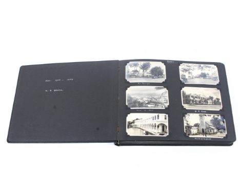 A vintage photo album containing photos, prints and postcards of Fiji (1935-39), taken by N.F. Smith, including Suva, Mount K