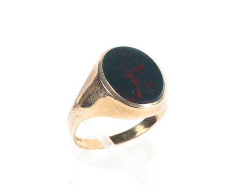 A 9ct gold gentleman's signet ring with oval bloodstone panel, 4.5g, Size R. 