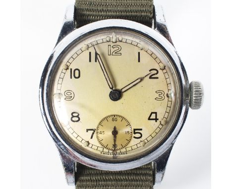 A Lemania ATP base metal wristwatch. 30.0mm case with champagne dial and numerical markings, case stamped ATP 06248 below mil