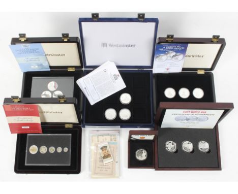 Silver coins - Proof sets to include Britain at war, Armed Forces tribute and other examples of Silver and enamel collectors 