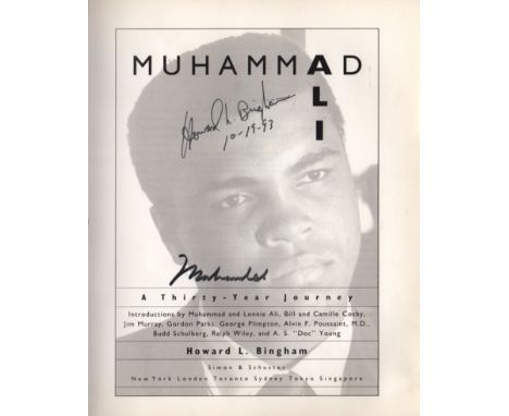 ALI MUHAMMAD: (1942-2016) American Boxer, World Heavyweight Champion. Book signed, being a hardback edition of Muhammad Ali -