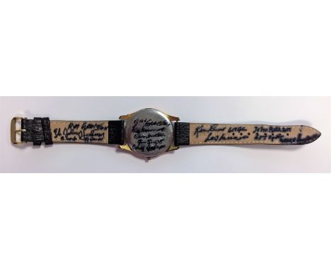 DAMBUSTERS THE: An unusual commemorative wrist watch and leather strap, the face featuring the colour emblem of the Royal Air