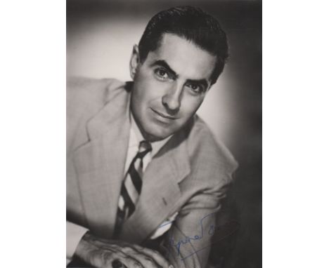 ACTORS: Tyrone Power (1914-1958) American Actor. Vintage signed 6½ x 8½ photograph, the image depicting Power in a half-lengt