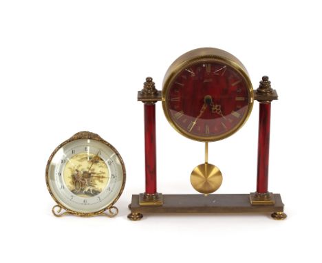 A mid-20th Century German faux tortoiseshell mantel clock; and a chinoiserie decorated Swiss alarm clock