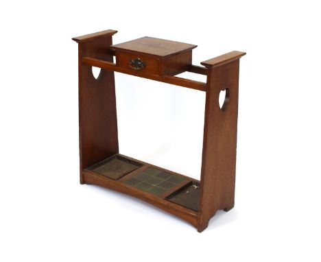 An oak Arts &amp; Crafts design hall stand, fitted with a single drawer, flanked by slatted ends with heart motifs, tile inse
