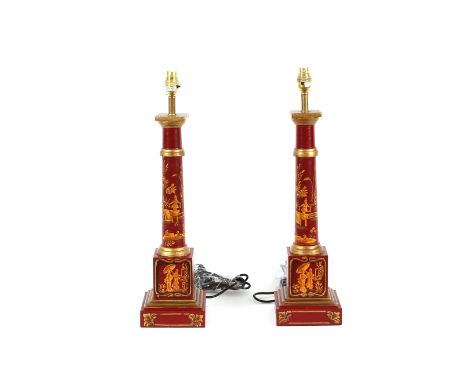 A pair of red Tolware type table lamp columns, decorated in the chinoiserie manner, 61cm high