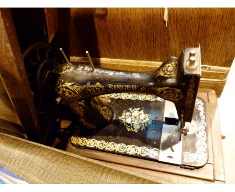 Vintage wooden cased Singer sewing machine