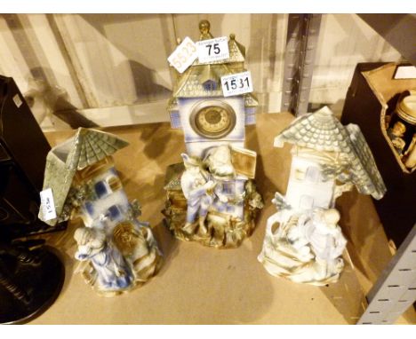 Continental ceramic garniture with figural design