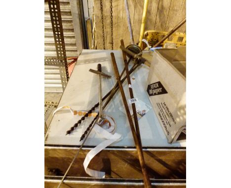 Mixed tools including drills and a set of golf clubs