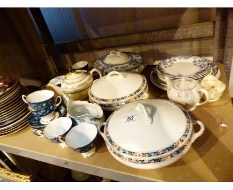 Shelf of mixed ceramic dinnerware including Shelley 