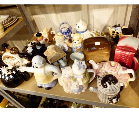 Shelf of novelty teapots 