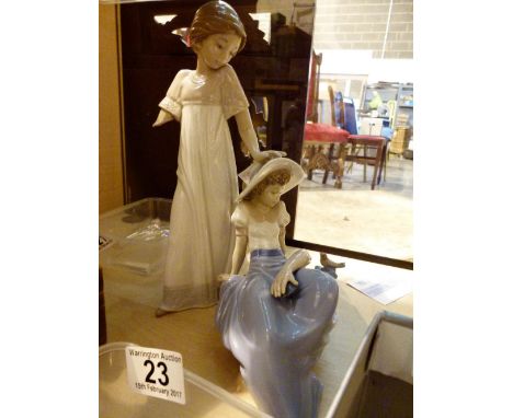 Two Nao female figures, one A/F 