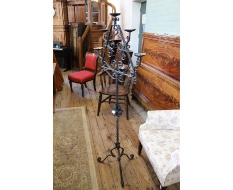 A vintage iron candle stand