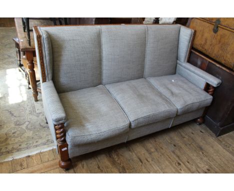 A good quality oak framed three seater sofa