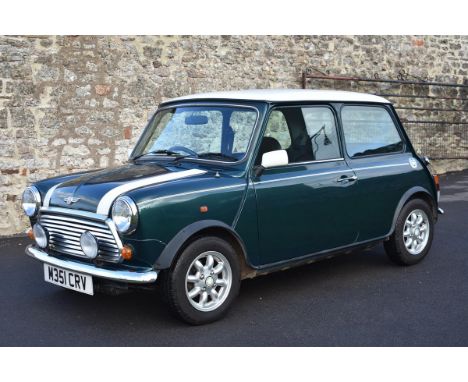 A 1994 Rover Mini Cooper 1.3 automatic, registration number M351 CRV, chassis number SAXXNNAXKBD084996, British Racing green/