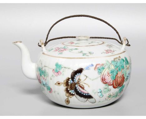 A Chinese Porcelain Teapot and Cover, 19th century, of compressed fluted globular form, painted in famille rose enamels, with