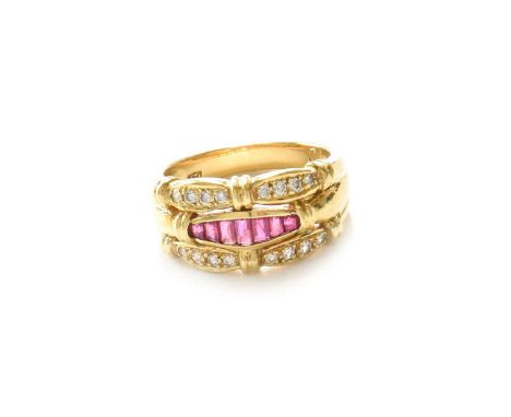 A Ruby and Diamond Ring, a row of graduated calibré cut rubies flanked by tapered rows of round brilliant cut diamonds, in ye