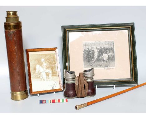 Military Interest; a photograph of a mounted military figure, signed Roberts, yellow metal mounted riding stick, a print of t