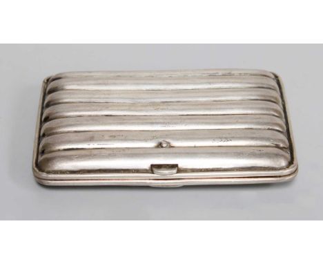 A Tin Trunk, containing copper, silver cigarette case, etc