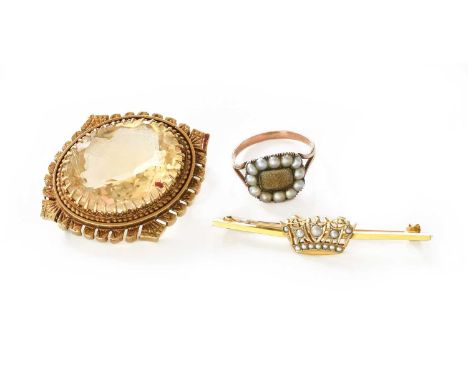 A 9 Carat Gold Coronet Brooch, set throughout with split pearls, length 4.7cm; A 9 Carat Gold Citrine Brooch, length 4cm; and