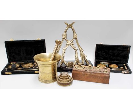 Collectors Items Including, a brass pestle and mortar, sets of scales and weights, and a clock bracket