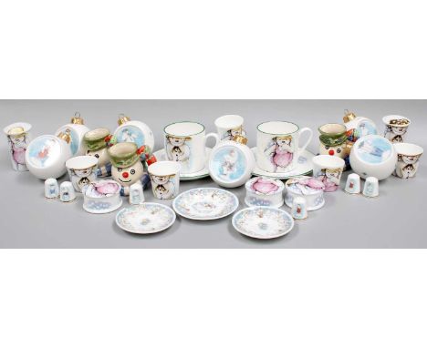 Royal Doulton Snowman, related items, including baubles, egg cups, trinket boxes and covers, etc (on two trays)