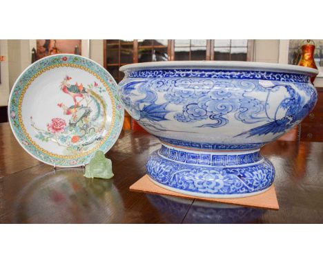 A Large Chinese Porcelain Circular Planter on Pedestal, painted in underglazed blue with dragons, 45cm diameter, together wit