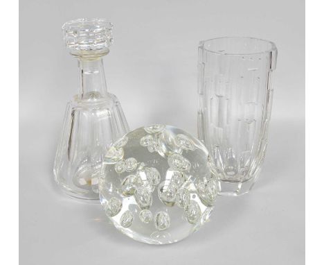 A Baccarat Facetted Glass Decanter, 23.5cm high, a similar vase possibly Orrefors and a large paperweight with bubble inclusi