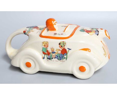 An Art Deco Sadler Teapot, modelled as a racing car and printed with designs in the manner of Mabel Lucie AttwellBoth cover a