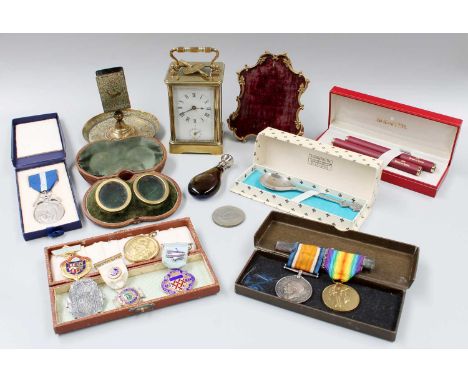 A Curio Lot, including silver and other Masonic medals, a French brass striking carriage clock, 14.5cm high over handle, mini