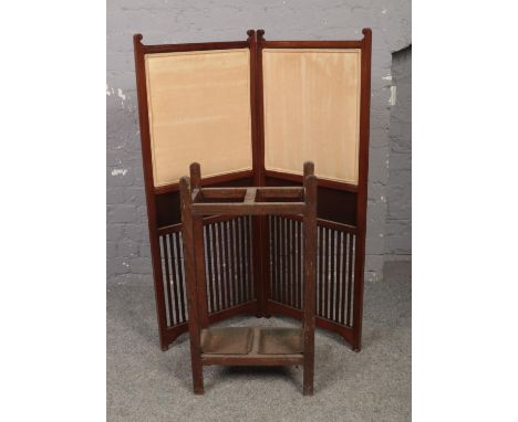 A Victorian mahogany folding dressing screen along with an oak stick stand.  