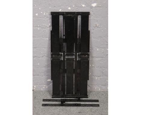 A heavy duty flatscreen television wall bracket. With scissor action and the ability to pivot, 73cm wide.  