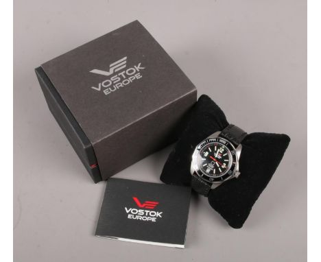 A boxed gentleman's Vostok Europe K-3 Submarine stainless steel automatic wristwatch on leather strap.  Running.