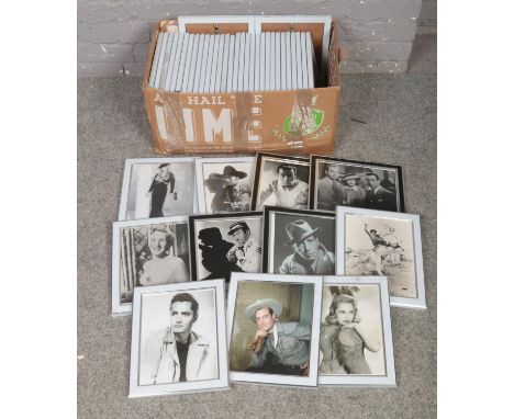 A box of framed print photographs of actors/actresses from early black and white films.  