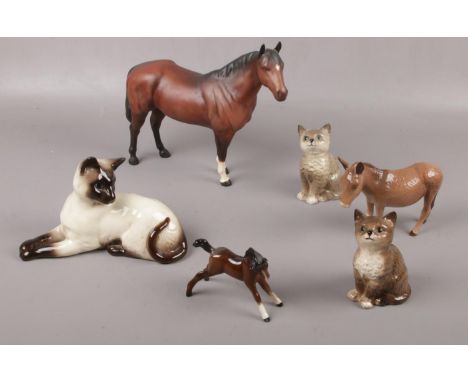 Five Beswick ceramic figures, Horse, Donkey, Cats, Foal, to include a Royal Doulton ceramic cat  