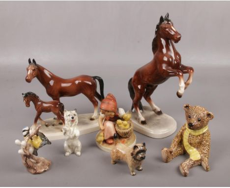 A collection of ceramic figures, to include Katzhutte, Royal Doulton, Beswick etc.  