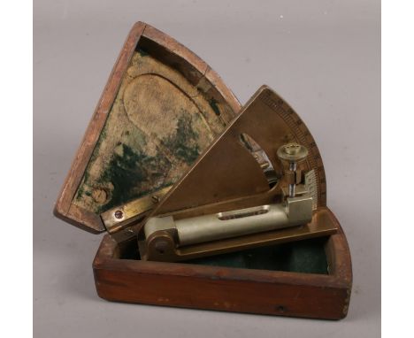 A wooden cased A.-G Hahn Cassel brass level, possibly artillery gun attachment.  