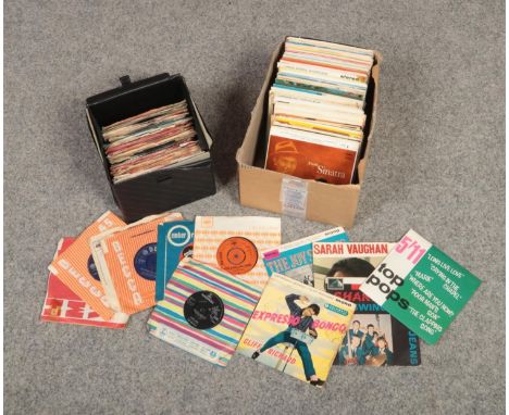 A box and a carry case of single records and EPs, to include picture sleeves, The Beatles, Bob Dylan, The Rolling Stones etc.