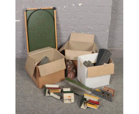 A collection of vintage games to include Tri-ang track, Scalextric buildings, Kay bagatelle board etc.  