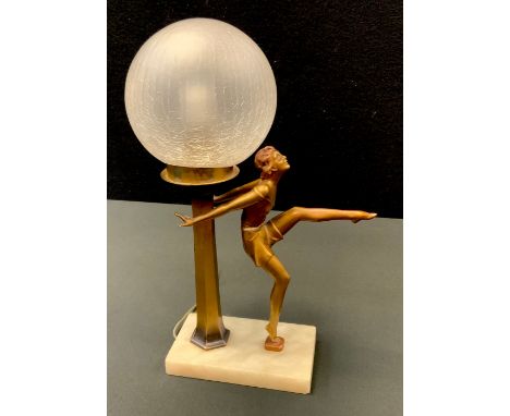 An Art Deco patinated spelter table lamp, Joseph Lorenzl style Dancing Girl, crackle glass globular shade, onyx base, 32cm hi